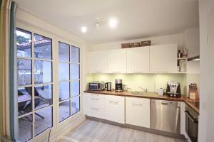 Kuchyň nebo kuchyňský kout v ubytování Haus Meeresblick - Ferienwohnung Auszeit (Ref. 136764)