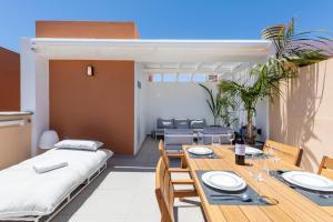 Posezení v ubytování MEDANO4YOU Vitamin Sea Penthouse