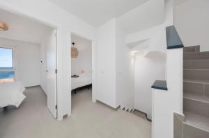 Postel nebo postele na pokoji v ubytování MEDANO4YOU Vitamin Sea Penthouse