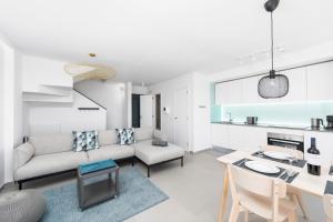 Kuchyň nebo kuchyňský kout v ubytování MEDANO4YOU Vitamin Sea Penthouse