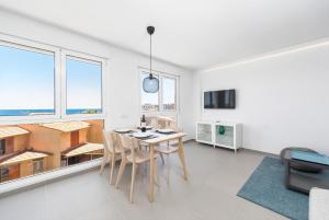 TV a/nebo společenská místnost v ubytování MEDANO4YOU Vitamin Sea Penthouse