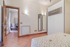 A bed or beds in a room at When in Trastevere