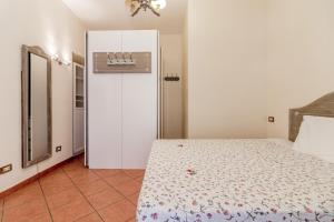 A bed or beds in a room at When in Trastevere