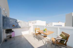 Un balcon sau o terasă la Vela Blu Apartments - Rose Court