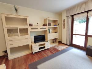 A bed or beds in a room at LA PLAYA DE TOÑA by Urdaibai Rentals