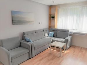 Posedenie v ubytovaní YourBestApartment Jagiellonska + 1 fotografia
