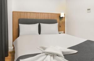 Postel nebo postele na pokoji v ubytování Silvana Hotel