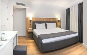 Postel nebo postele na pokoji v ubytování Silvana Hotel