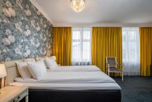 Postel nebo postele na pokoji v ubytování Thon Hotel Sandven
