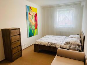 Posteľ alebo postele v izbe v ubytovaní Apartmány VIA Klínovec