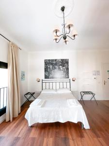 En eller flere senge i et værelse på Ostello Bello Napoli