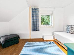 Postel nebo postele na pokoji v ubytování Holiday home MIDSUND VII
