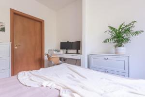 A bed or beds in a room at Villa Patrizia