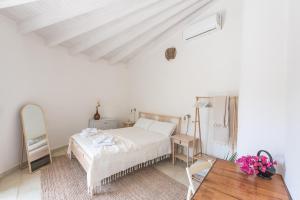 A bed or beds in a room at Villa Patrizia