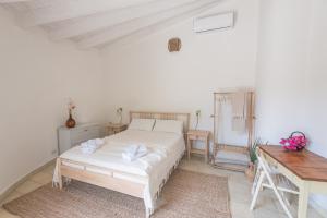 A bed or beds in a room at Villa Patrizia