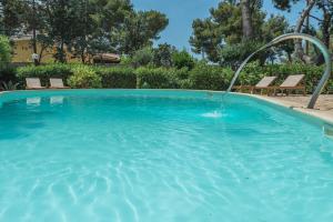 The swimming pool at or close to Villa Patrizia