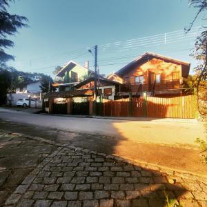 Photo de la galerie de l'établissement chales e aptos Carvalhos em monte verde, à Monte Verde