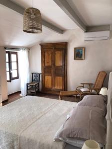 Кровать или кровати в номере Chez Jean Nonza