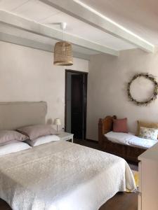 Кровать или кровати в номере Chez Jean Nonza