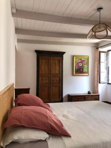 Кровать или кровати в номере Chez Jean Nonza