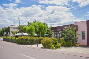 a store on the side of a street at Hotel Solar in Focşani