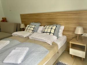 Postel nebo postele na pokoji v ubytování H2O