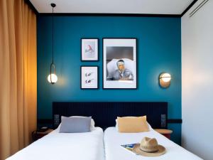 Voodi või voodid majutusasutuse ibis Styles Dijon Central toas