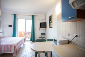 Kuchyň nebo kuchyňský kout v ubytování Residence Reale