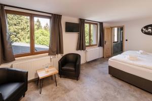 Postel nebo postele na pokoji v ubytování Wellness aparthotel Martiňák
