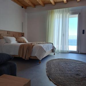 Postel nebo postele na pokoji v ubytování Nisaki Hotel & Elite Suites