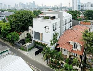 an aerial view of a building in a city at Sakura Terrace Benhil in Jakarta
