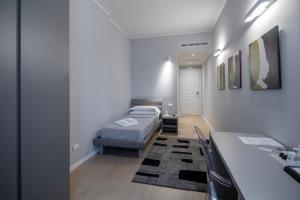 Voodi või voodid majutusasutuse Golgi Suite toas