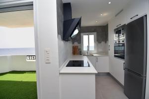 Kuchyň nebo kuchyňský kout v ubytování Apartamento amanecer + 8 fotografií