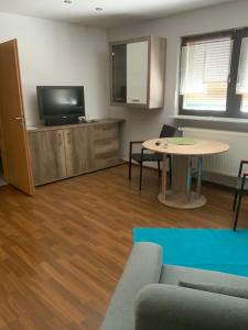 Kuchyň nebo kuchyňský kout v ubytování Ferien/ Monteurzimmer mit gemeinsam Wozi, Kü, Bad, WLAN