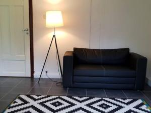 Area soggiorno di Private Room in Shared House-Close to University and Hospital-6