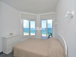 A bed or beds in a room at Marina A-4