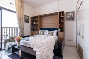Postel nebo postele na pokoji v ubytování The Smart Concierge - Glamz Residence