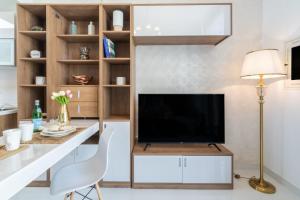 TV a/nebo společenská místnost v ubytování The Smart Concierge - Glamz Residence