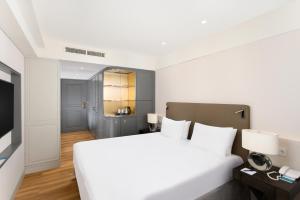 Katil atau katil-katil dalam bilik di Danubius Hotel Astoria City Center