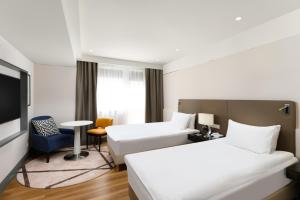 Katil atau katil-katil dalam bilik di Danubius Hotel Astoria City Center