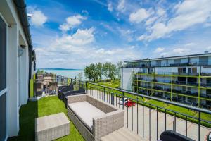 A balcony or terrace at Andante Panoráma Apartman