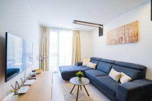 A seating area at Andante Panoráma Apartman