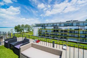 A balcony or terrace at Andante Panoráma Apartman