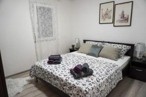 Postel nebo postele na pokoji v ubytování Apartments Fabio