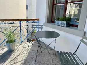 A balcony or terrace at Stadtjuwel mit Pfänderblick