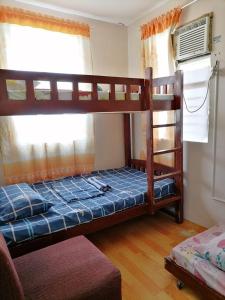 Postel nebo postele na pokoji v ubytování Eurie's Furnished Unit