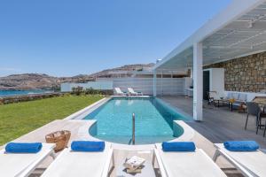 a swimming pool on the roof of a house at Villa Akrotiri in vlicha