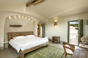 Postel nebo postele na pokoji v ubytování Gallicantu Stazzo Retreat