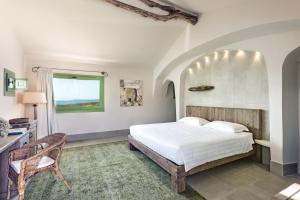 Postel nebo postele na pokoji v ubytování Gallicantu Stazzo Retreat