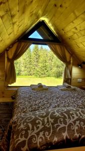 Кровать или кровати в номере Brvnara Miris Bora